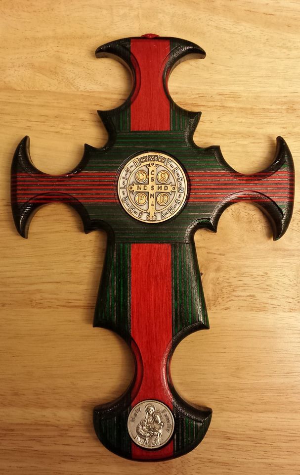 http://www.crossofstbenedict.com/st-benedict-christmas-cross-with-holy-family-medal/